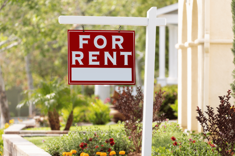 For Rent sign in front of a rental property