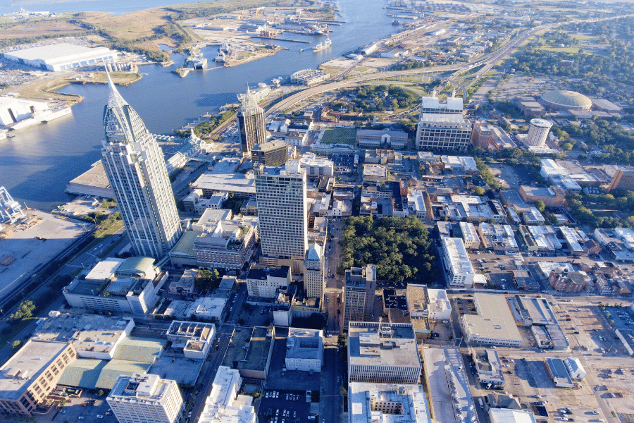 Aerial view of Mobile, AL with buildings during the day