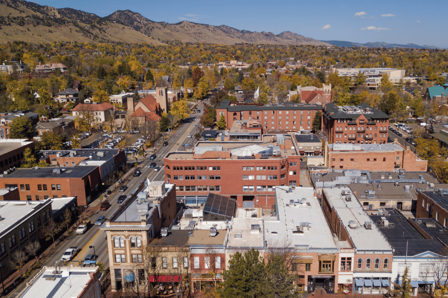 Boulder CO Overview with the mountains in the background and buildings around