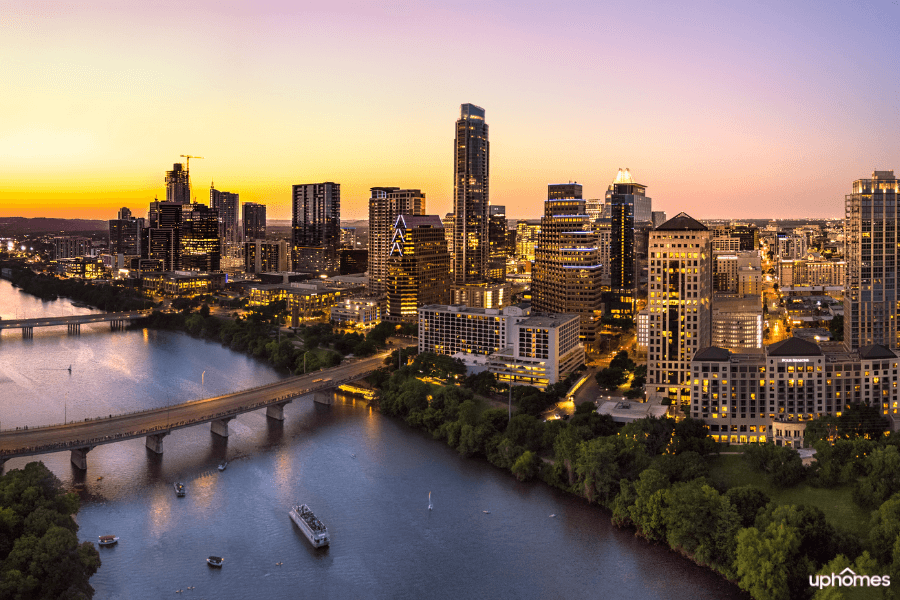 Austin, TX city skyline with the sunsetting over the city