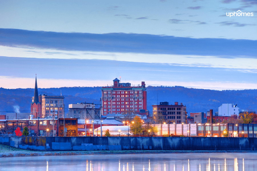 Binghamton city photo with water and buildings in the background