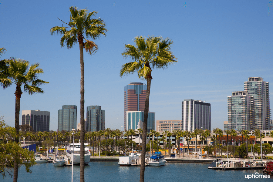 Scenic view of Long Beach, California on a sunny day with water, boats and buildings