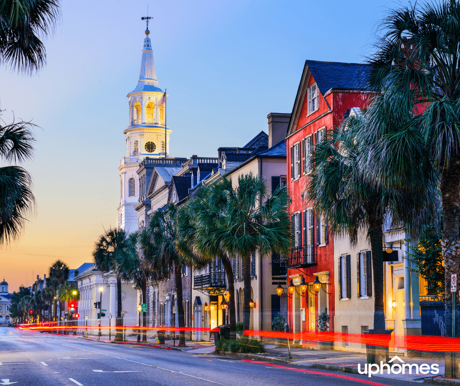 Downtown Charleston, South Carolina at night time with a shot of the sunset and famous buildings