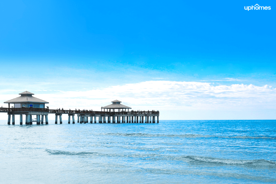 Fort Myers Pier on a nice sunny day with beautiful water and the beach