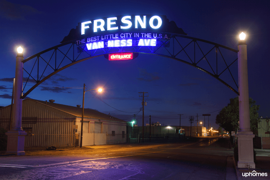 Fresno, CA sign lit up at night that reads Fresno The Best Little City In The USA