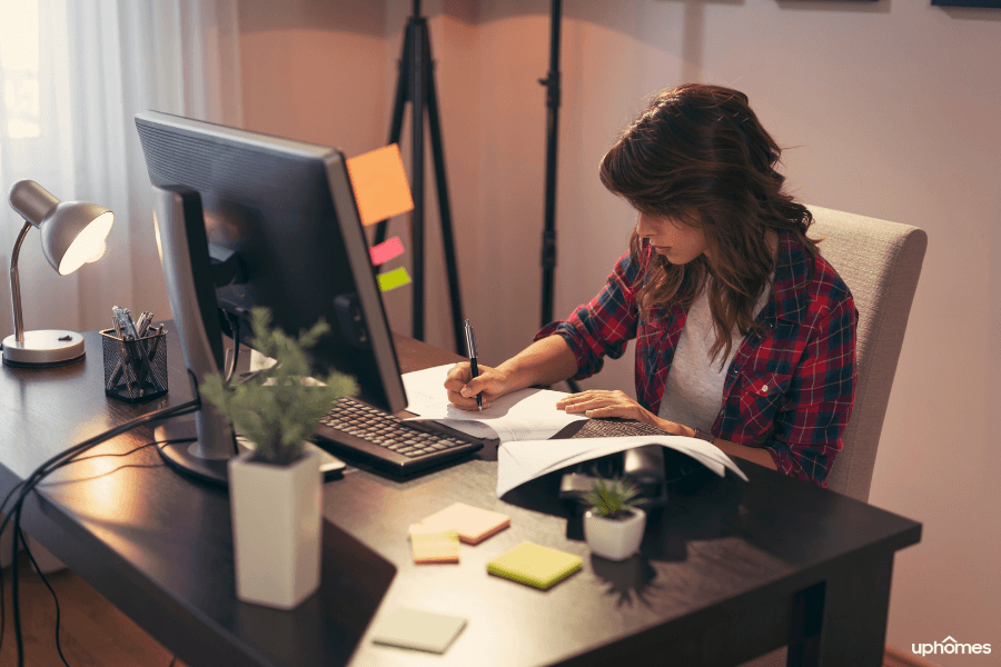 Intense home office worker with a productive environment set up at home with plants and great lighting