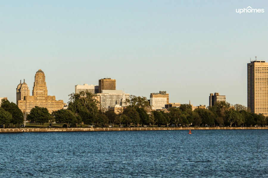 Hoyt Lake in Buffalo NY with the city skyline in background and people boating