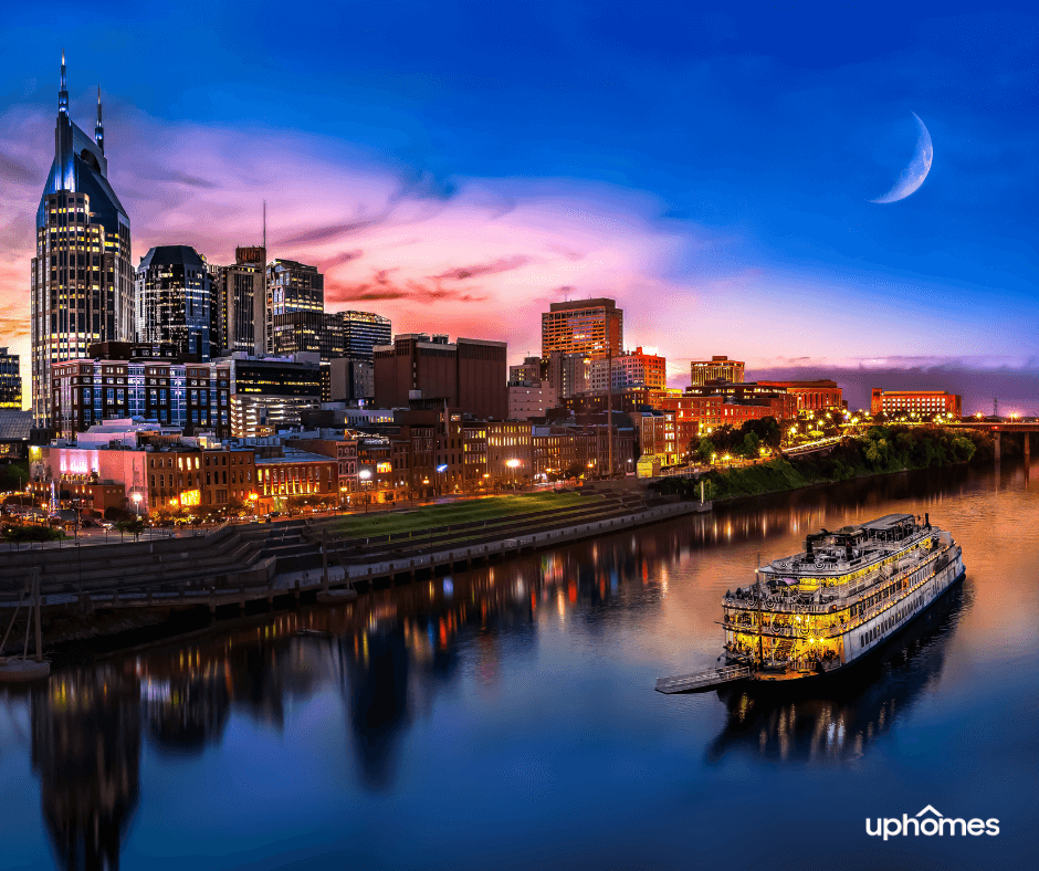 Nashville Downtown Skyline w/ Cruise ship on Water and a sunset sky that shows the outline of the moon ready to emerge