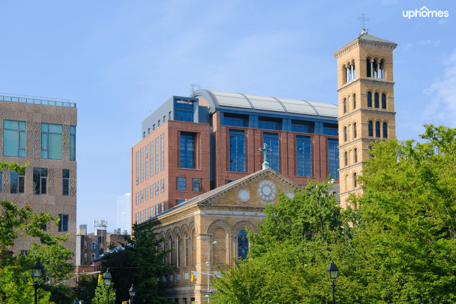 Photo of New York University with a classroom building on a sunny day in New York