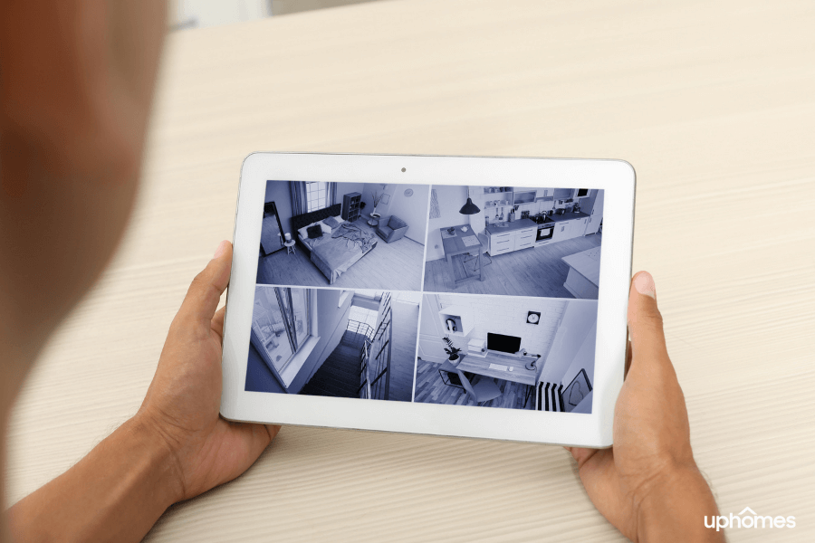 A smart device that is attached to the home security system with cameras able to connect to a tablet