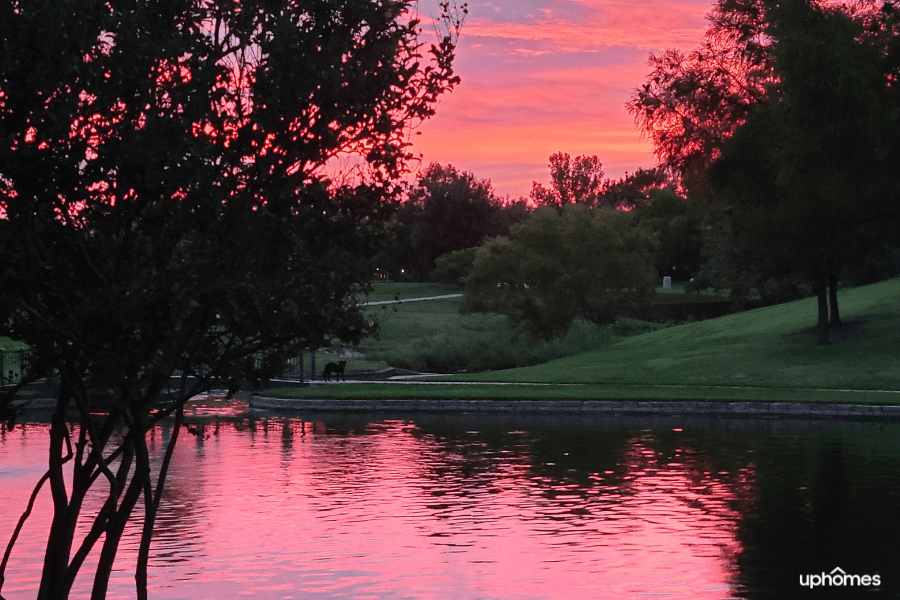 Plano TX Park at sunset with water and lake in the foreground
