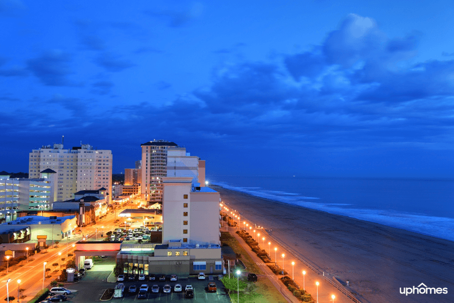Downtown Virginia Beach at night time with a picture of how close the ocean is