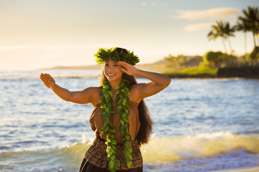 Hawaiian Hula Dancer in Kauai at sunset on the beach