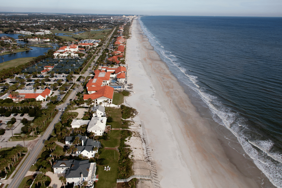 Aerial view of the beach and buildings in Jacksonville, FL 