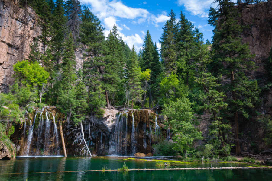 Hanging Lake a lake in Colorado with a beautiful setting on a sunny day