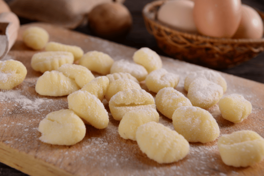 homemade gnocchi on a wood board 