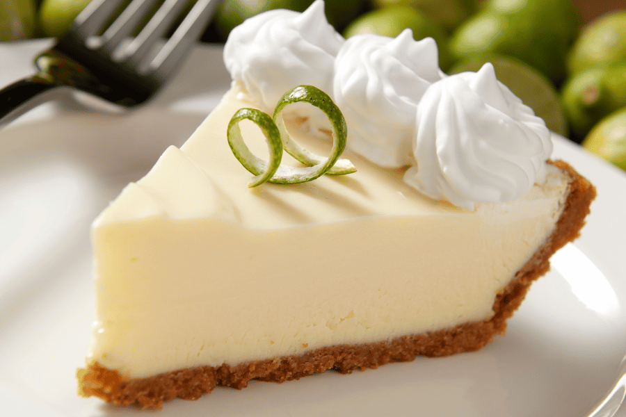 slice of key lime pie with whipped cream 