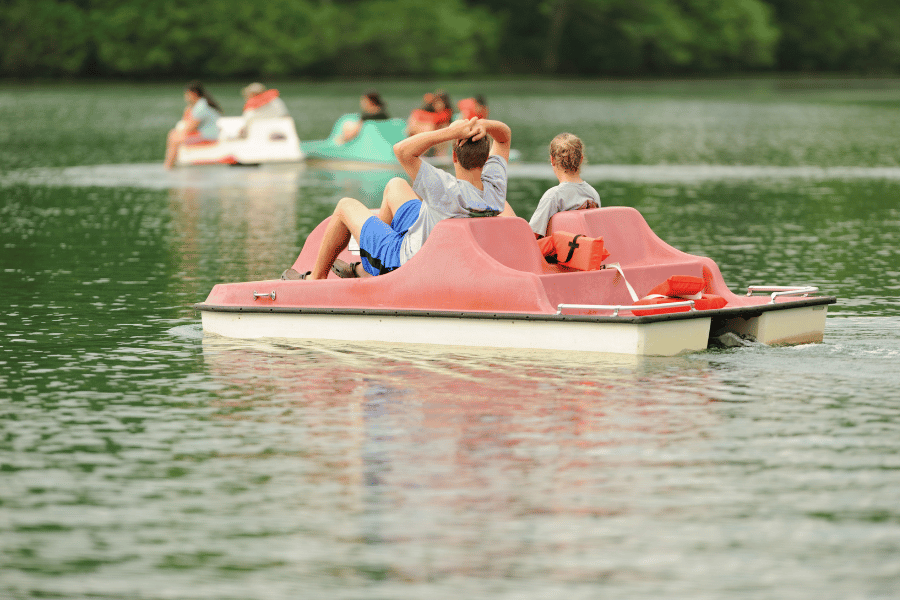 people on pedal boat during a warm day 