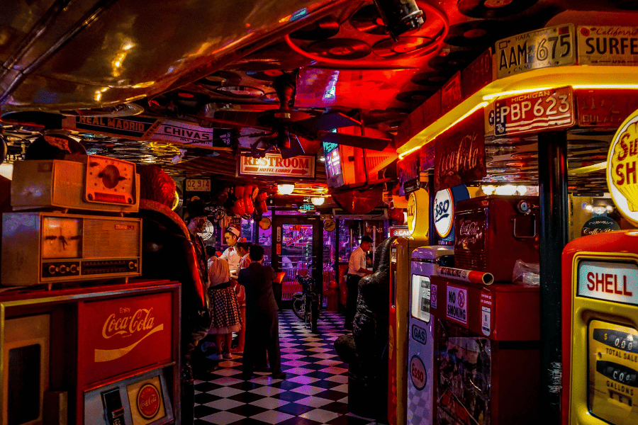 cool arcade with lights and checkered floor