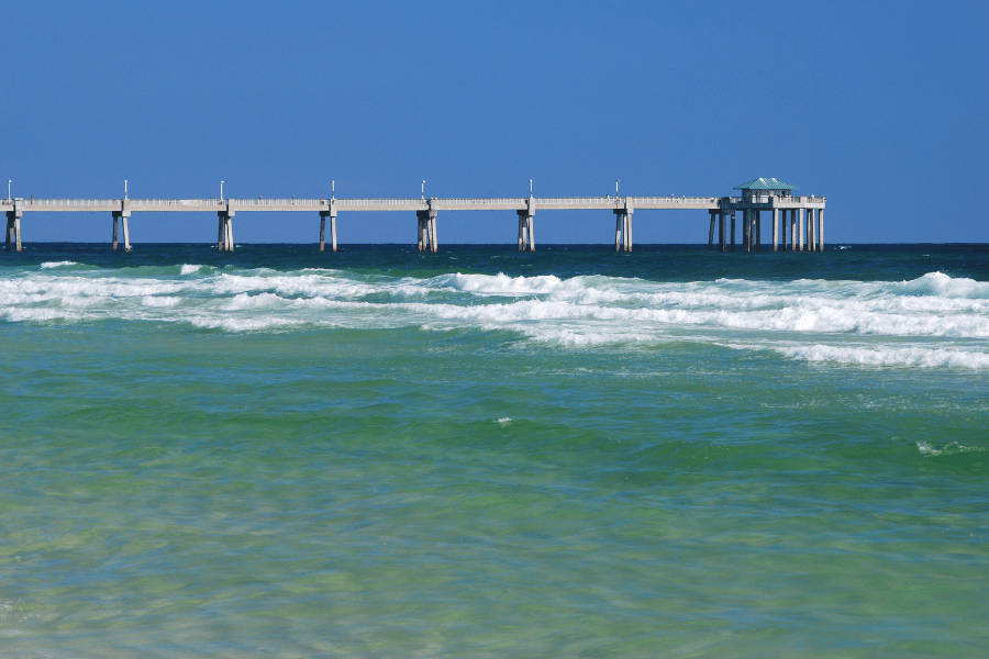 Fort Walton Beach Pier on the beach blue water 