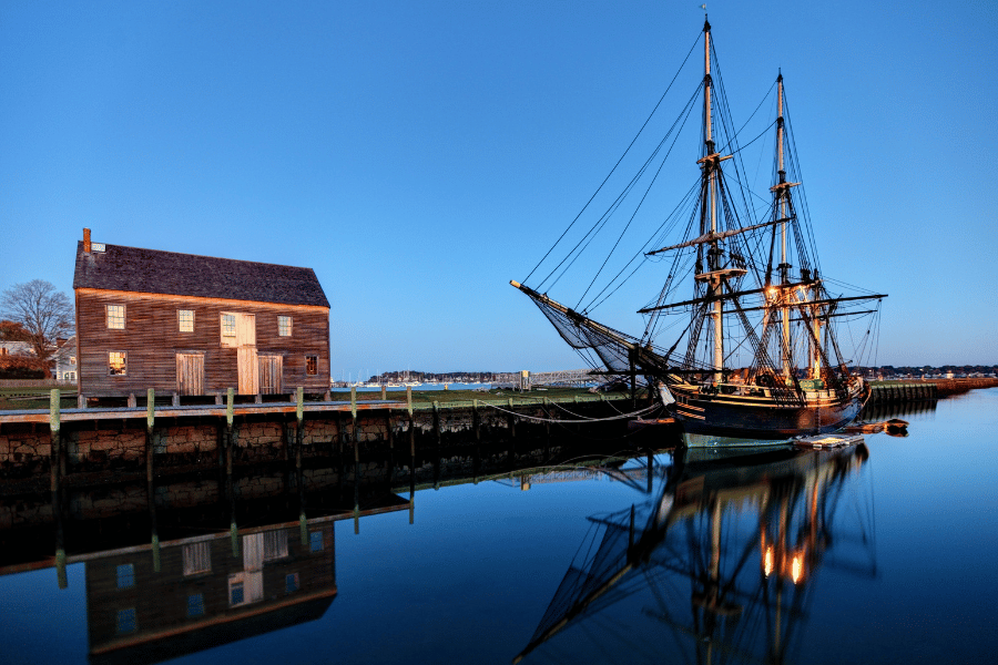 commercial dock in Salem, MA with passenger ship 