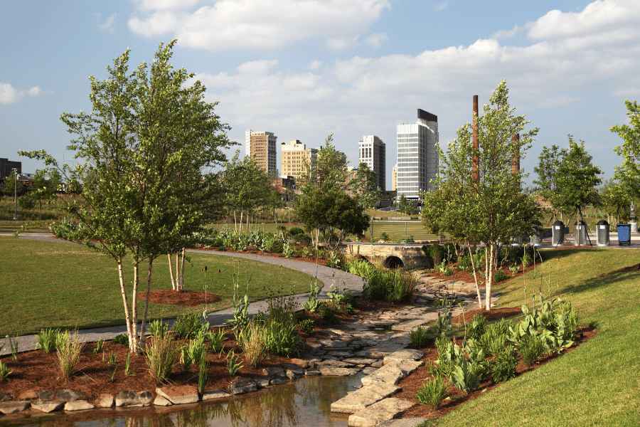 Park in Birmingham, AL with green trees and plants 