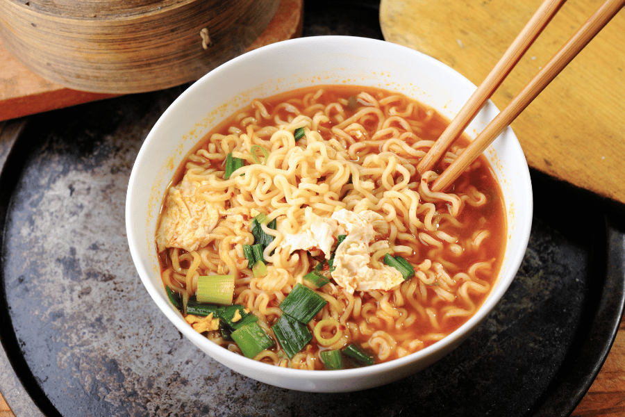 bowl of ramen with chop sticks