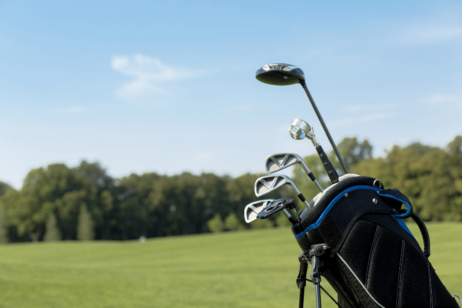 golf bag on a golf course on a sunny day