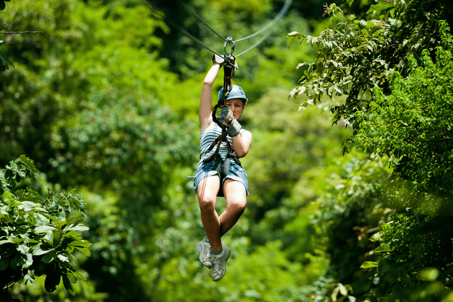 ziplining through the woods 