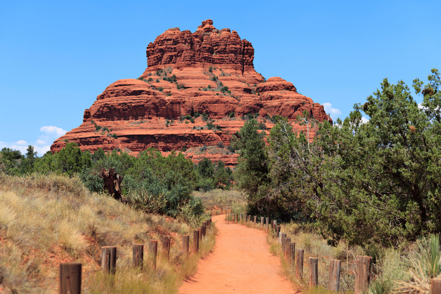 Bell Rock in Sedona, AZ on a sunny day with walking trail
