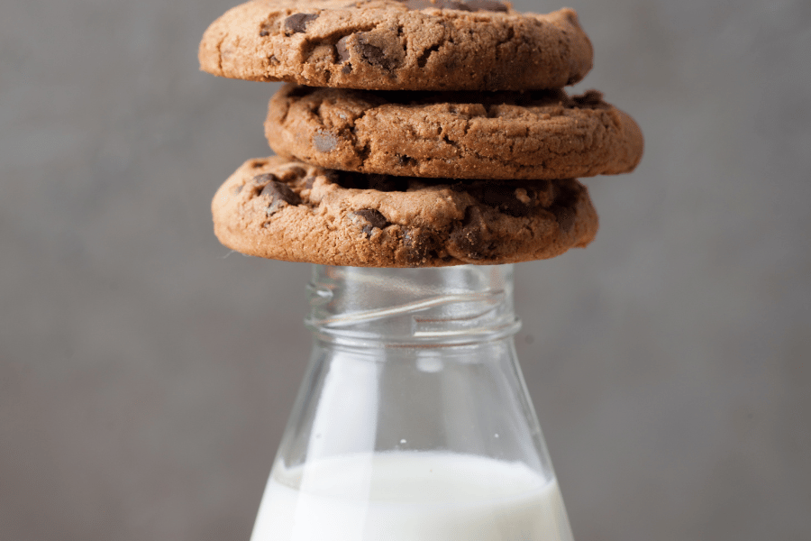 cookies on top of milk bottle