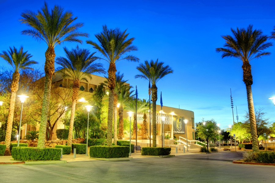 City Hall in Henderson, NV at dusk with palm trees 