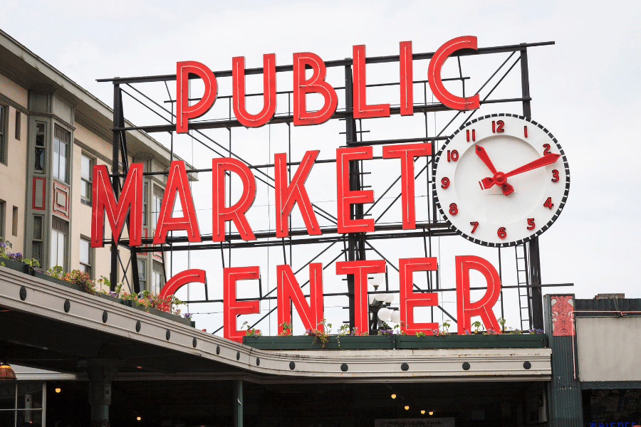 Pike Place Market sign with clock 
