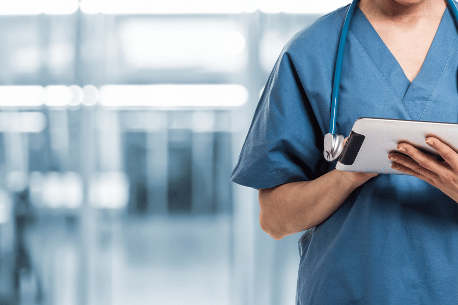 healthcare worker in blue scrubs 