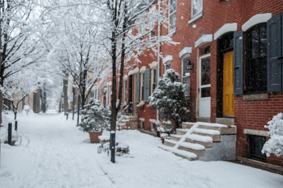 Image of snow in front of Philadelphia homes