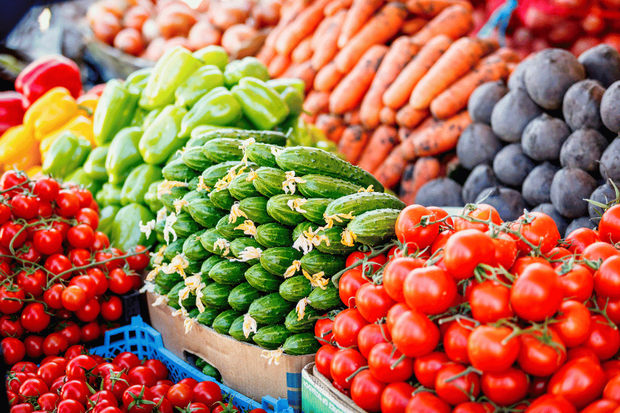 Rows of fresh produce at a farmer's market