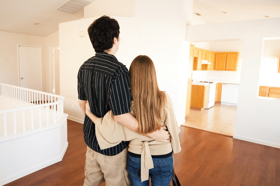 Couple in their first home purchase
