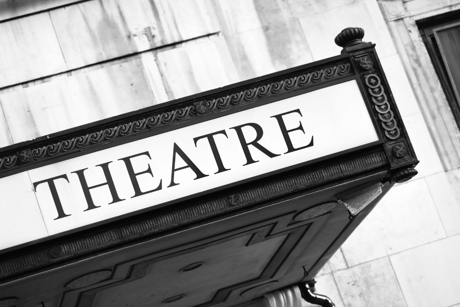 black and white theatre sign