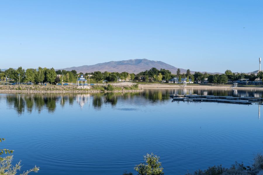 Sparks Marina in Sparks, NV on a warm sunny day with trees and mountains 