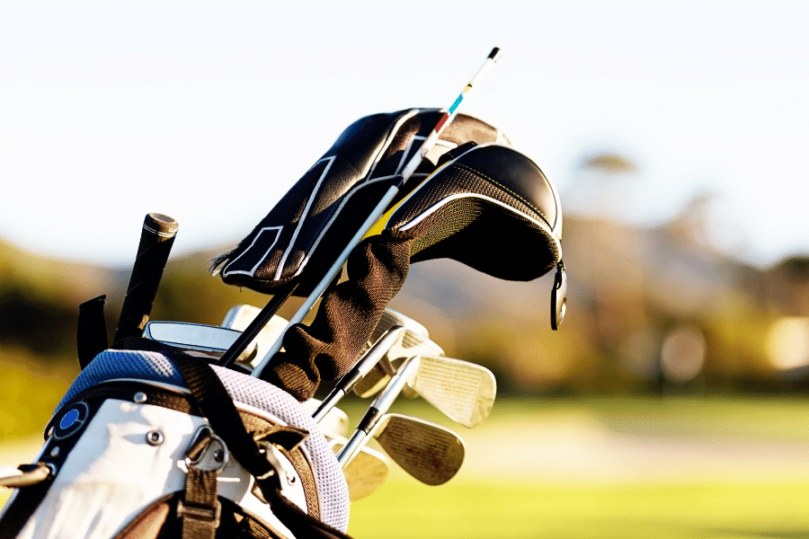 golf bag on a golf course on a sunny day