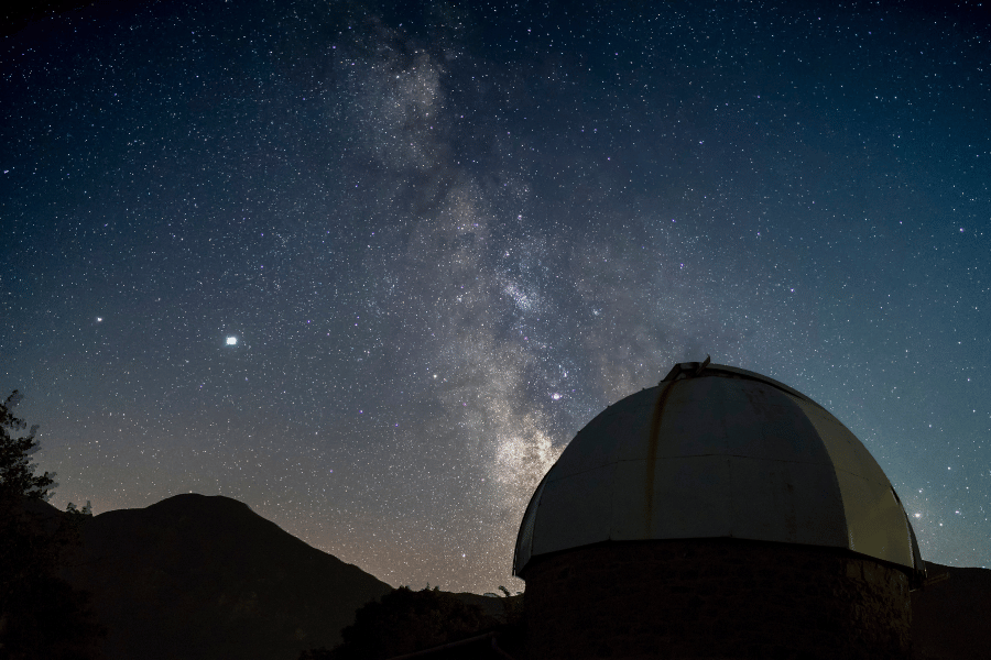 observatory and starry night sky