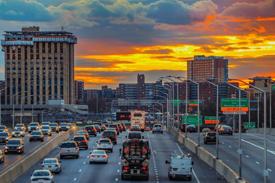 cars driving during sunset 