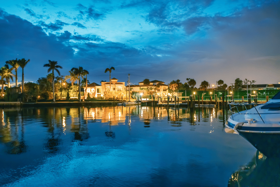 Boca Raton, FL at Sunset buildings reflecting off of the water 