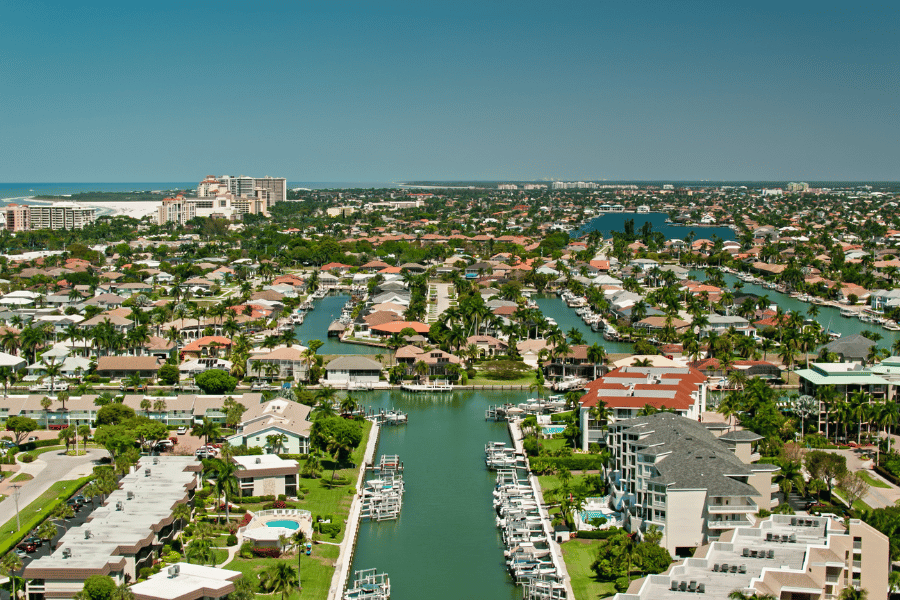 Homes alongside the Marco Island, FL Canals with boats
