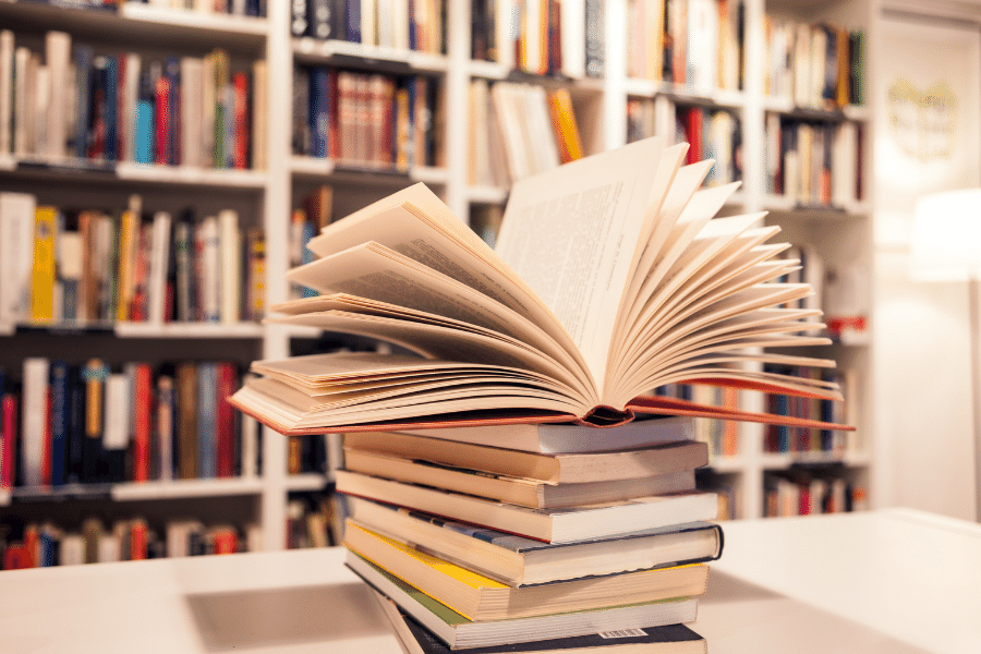 stack of books in a bookstore 