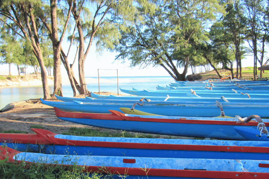 Kailua, HI beach with blue canoes 