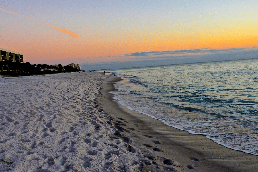 longboat beach sarasota florida during a beautiful orange sunset