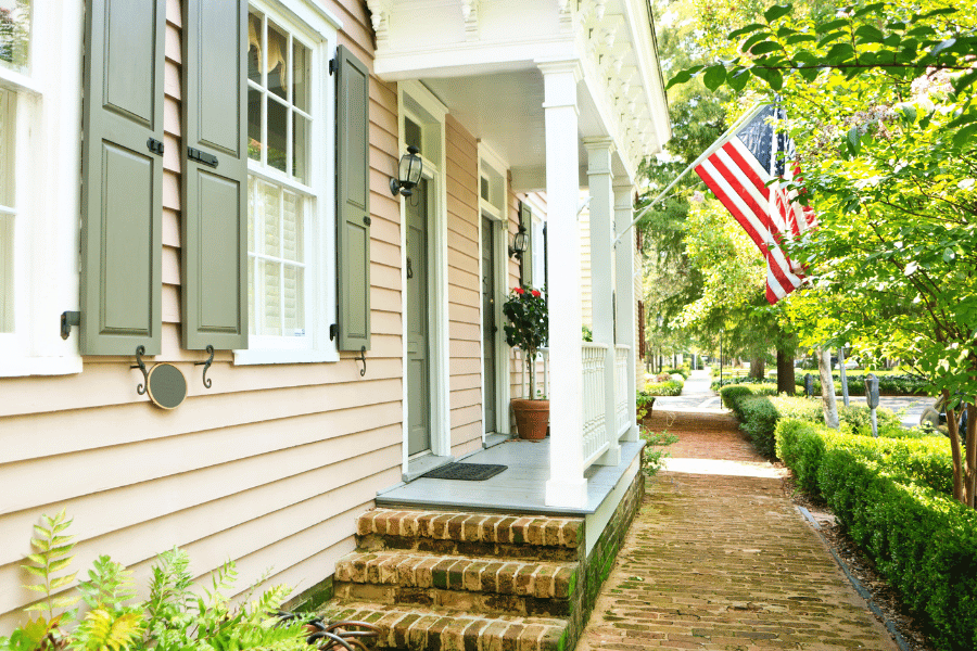 Average American home front porch with US flag