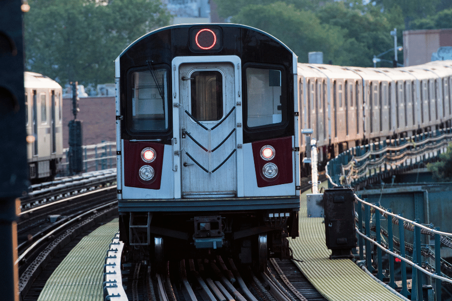 Subway car on tracks outdoors