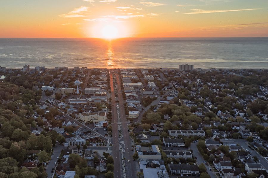 Overview of Rehoboth Beach, DE, during sunset